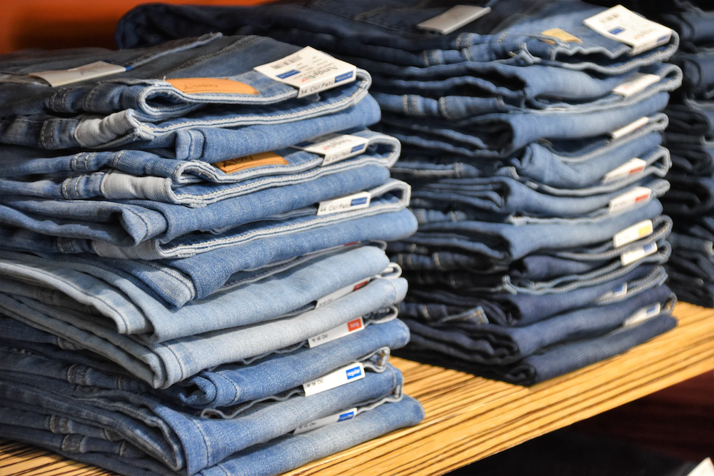 jeans folded on shelf