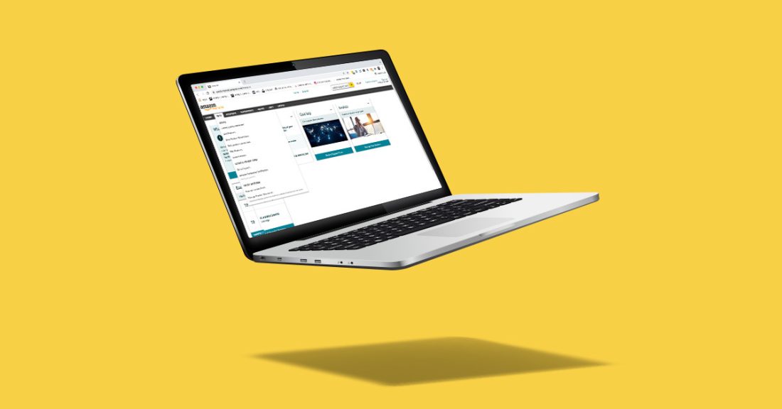 laptop open to amazon with yellow background